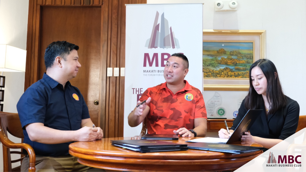 Pilipinas Shell Conrad Parizal (Social Performance – Social Investment Manager) and San Juan Mayor Francis Zamora discusses the benefits of installing asphalt art in front of San Juan City for bike commuters and pedestrians' safety.